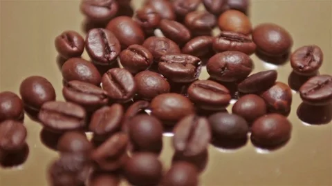 Roasted coffee beans on grey background seamless rotating Stock Footage 80353723