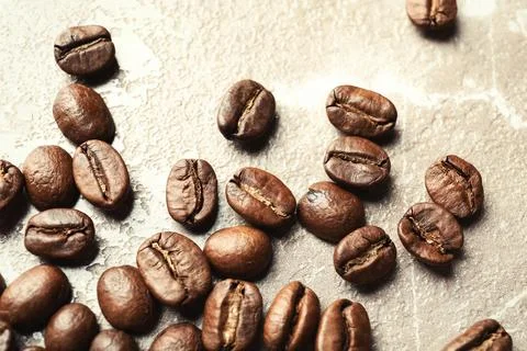 Roasted coffee beans on grey background, closeup 写真素材