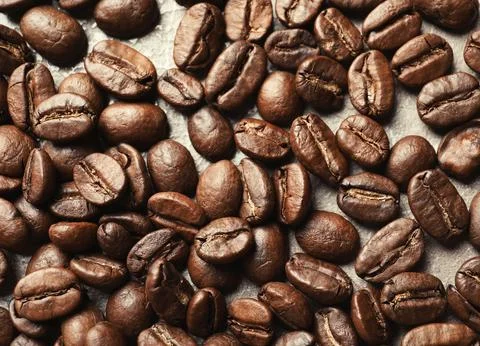 Roasted coffee beans on grey background, closeup 写真素材