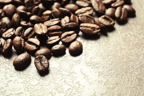 Roasted coffee beans on grey background with space for text, closeup 写真素材