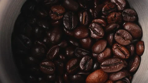 Roasted coffee beans grinding by Electric coffee grinder Stock Footage 170560078