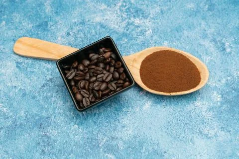 Roasted coffee beans, ground coffee, Cup of coffee, Wooden spoon with roasted Stock Photos