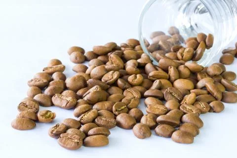 Roasted coffee beans on isolate white background Stock Photos