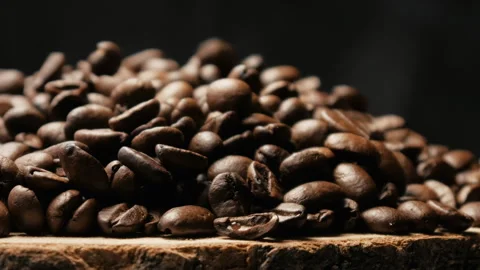 Roasted coffee beans lie in a pile. Stock Footage 263064137