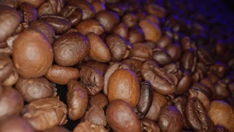 Roasted coffee beans macro shot, panorama from the right. vertical video Stock Footage 303070851