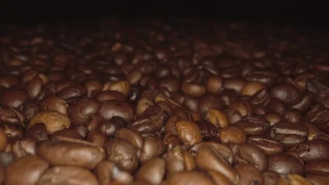 Roasted coffee beans macro shot, panorama from the right. vertical video Stock Footage 303071043