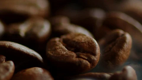 Roasted coffee beans macro view in slow motion in 240 fps, barista prepare Video stock 119084737
