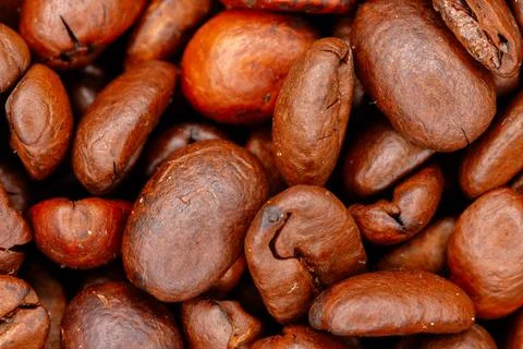 Roasted coffee beans macro view showing texture and detail Stock Photos