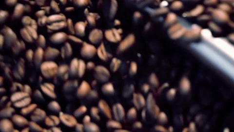 Roasted Coffee Beans Mixed And Cooled. Slow motion. Видео 100900737