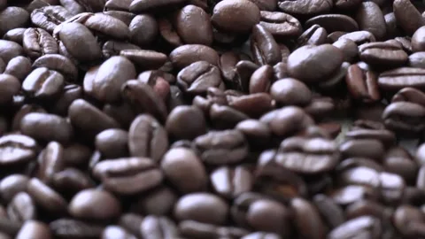 Roasted coffee beans panning up Stock Footage 197584374