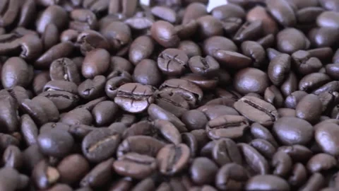 Roasted coffee beans panning Stock Footage 197584377