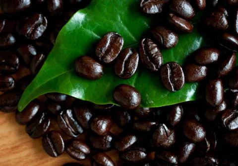 Roasted coffee beans . Stock Photos