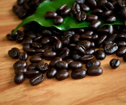 Roasted coffee beans . Stock Photos
