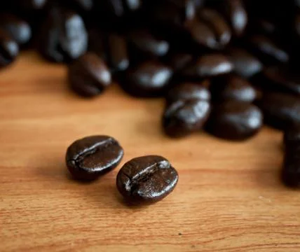 Roasted coffee beans . Stock Photos