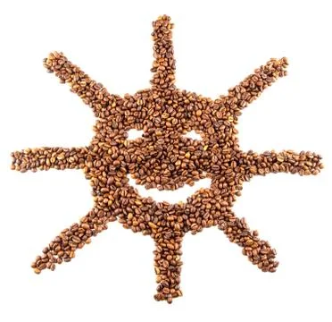 Roasted coffee beans placed in the shape of a smiling sun Stock Photos