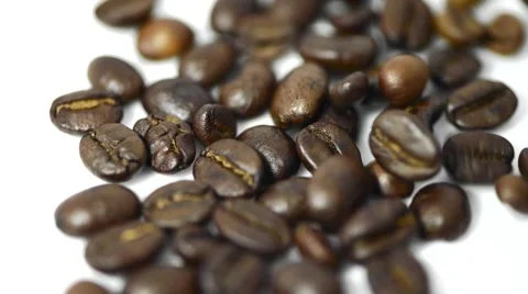 Roasted Coffee beans poured on white background HD Stock Footage 60119333