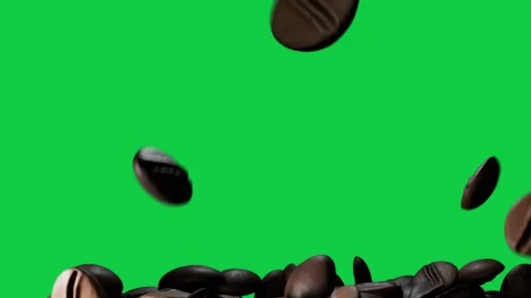Roasted coffee beans pouring offscreen, rotating, falling, settling into pile on 스톡 동영상 337506423