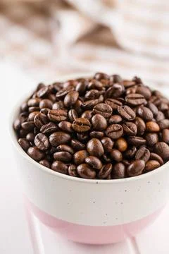 Roasted coffee beans. Roasted coffee beans in bowl. Copyright: xZoonar.com... Stock-Fotos