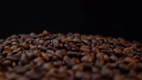 The roasted coffee beans rotate counter-clockwise. Stock Footage 93898749