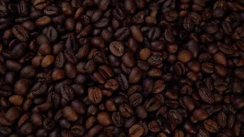 The roasted coffee beans rotate counter-clockwise. Stock Footage 93899152