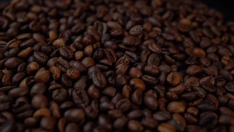 The roasted coffee beans rotate counter-clockwise. Stock Footage 93899271