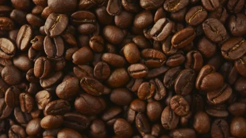 Roasted coffee beans rotate. View from above. Stock Footage 268302904
