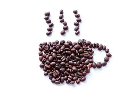 Roasted coffee beans scattered into a shape of a cup Stock Photos