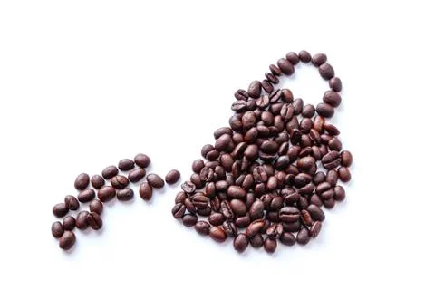 Roasted coffee beans in a shape of a cup pouring or spilling coffee Stock Photos