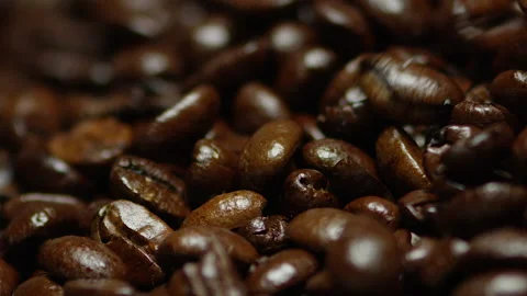 Roasted coffee beans slow-motion drop Stock Footage 142070786