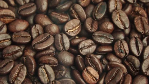 Roasted coffee beans, the smoke comes from the coffee beans. All elements will s Stock Footage 207174404