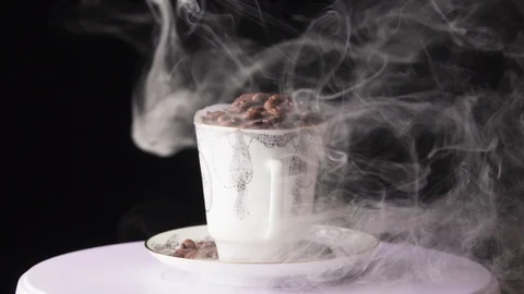 Roasted coffee beans with a smoke Stock Footage 101760118