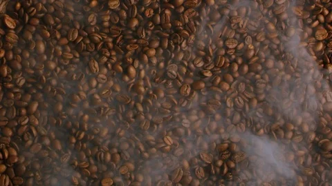 Roasted coffee beans with smoke in slow motion in 240 fps, barista prepare 動画素材 117934739