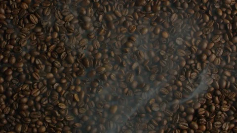 Roasted coffee beans with smoke in slow motion in 240 fps, barista prepare Video stock 119085086