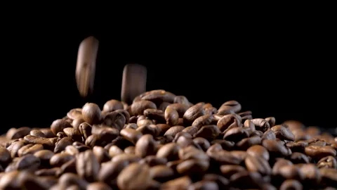 Roasted coffee beans. Smooth motion of arabica coffee seeds. Stock Footage 154207196