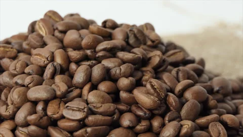 Roasted coffee beans spinning. 4K Stock Footage 195818562