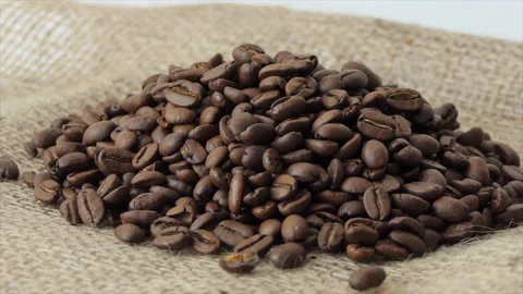 Roasted coffee beans spinning. 4K Stock Footage 196189424
