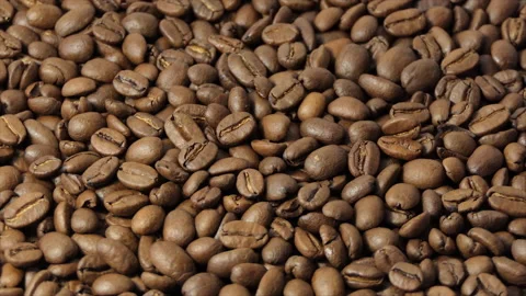 Roasted coffee beans spinning. 4K Stock Footage 196924665