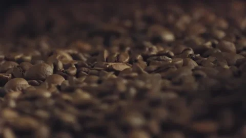 Roasted coffee beans spread on surface Stock Footage 311315939