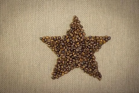 Roasted coffee beans in star shape Stock Photos