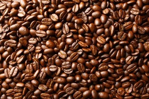 Roasted coffee beans, texture background. Stock Photos