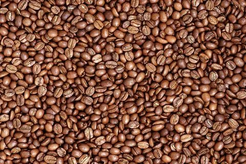Roasted coffee beans texture for background. Organic natural roast grain Stock Photos