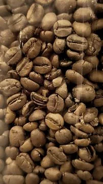 Roasted coffee beans texture close up background. Foto stock