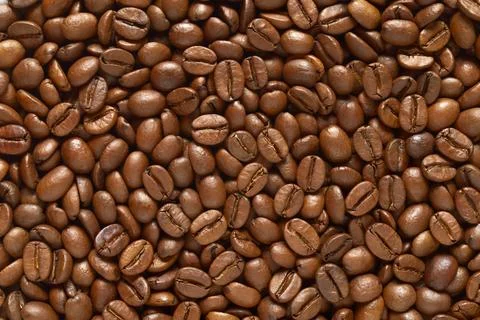 Roasted coffee beans texture or background. Stock Photos