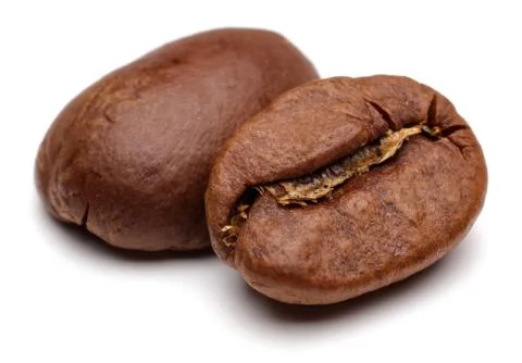 Roasted coffee beans on white background Stock Photos