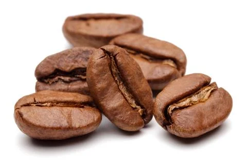 Roasted coffee beans on white background Stock Photos