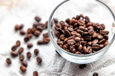 Roasted coffee beans on white background Stock Photos