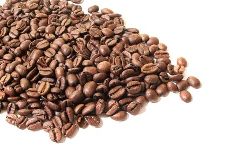 Roasted coffee beans on white background with isolate Stock Photos