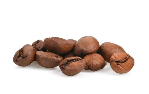 Roasted coffee beans on white background. Stock Photos