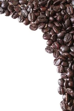 Roasted coffee beans on white background Stock Photos