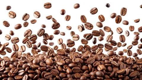 Roasted coffee beans on a white background. Stock Photos
